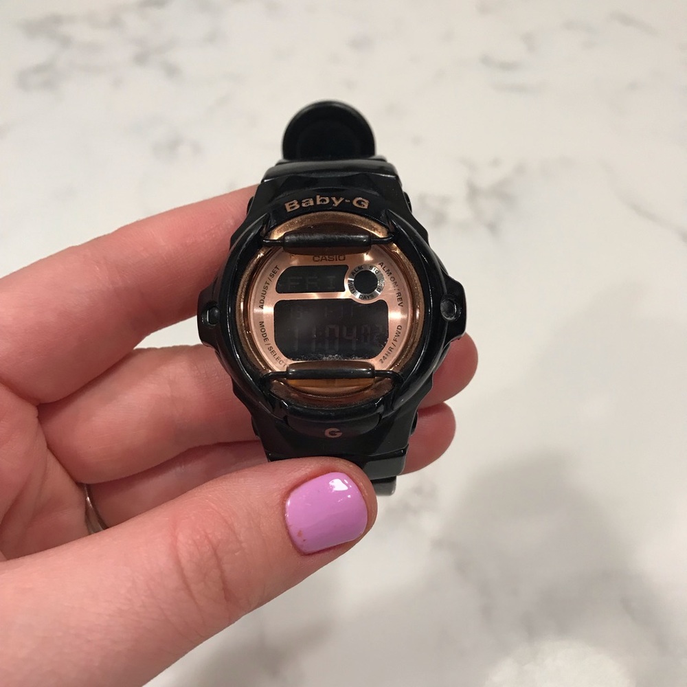 G Shock! Black with rose gold.